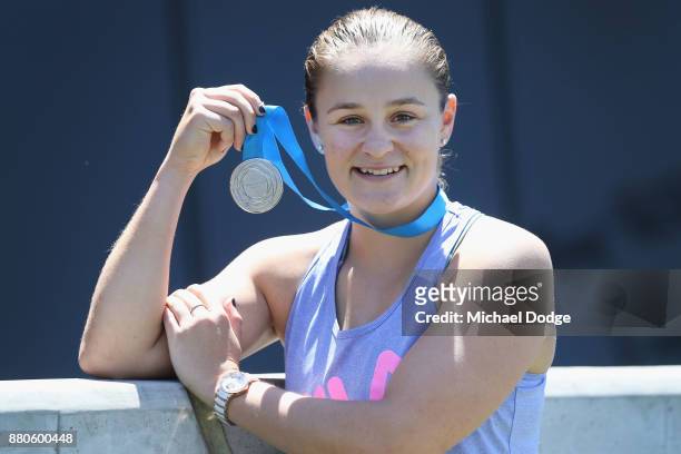 Ashleigh Barty poses with the 2017 Newcombe Medal at Melbourne Park on November 28, 2017 in Melbourne, Australia. Barty's rise up the WTA rankings...