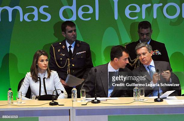 Spanish Crown Prince Felipe talks with Colombia´s President Alvaro Uribe and Princess Letizia during the opening ceremony of the V Terrorism Victims...