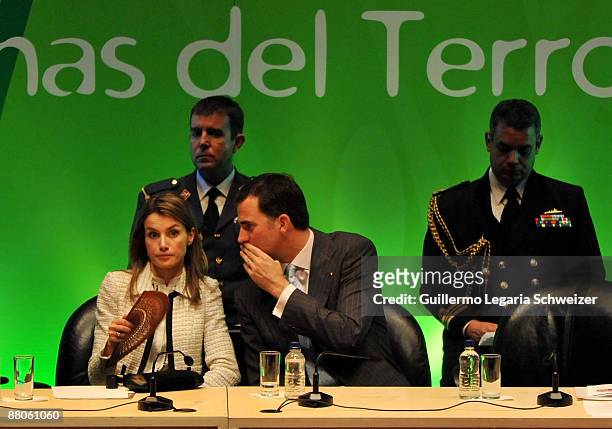 Spanish Crown Prince Felipe talks Princess Letizia during the opening ceremony of the V Terrorism Victims International Congress on May 29, 2009...