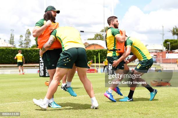 Players practice tackling during the Australian Kangaroos Rugby League World Cup training session at Langlands Park on November 28, 2017 in Brisbane,...