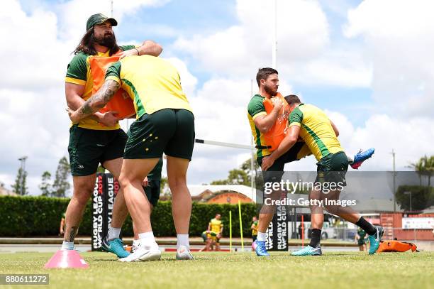 Players practice tackling during the Australian Kangaroos Rugby League World Cup training session at Langlands Park on November 28, 2017 in Brisbane,...