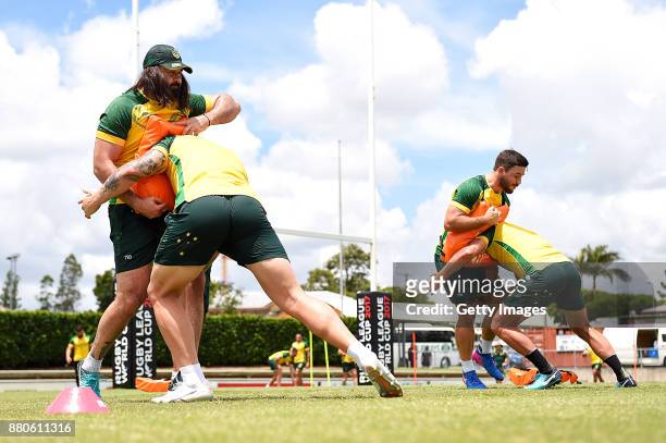 Players practice tacking during the Australian Kangaroos Rugby League World Cup training session at Langlands Park on November 28, 2017 in Brisbane,...