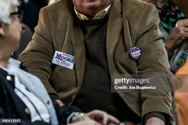 Judge Roy Moore supporters wait for a campaign rally to begin on November 27, 2017 in Henagar, Alabama. Over 100 people turned out to the event...