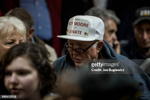 Judge Roy Moore supporters wait for a campaign rally to begin on November 27, 2017 in Henagar, Alabama. Over 100 people turned out to the event...