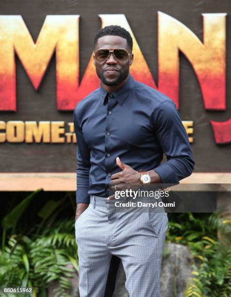 Actor Kevin Hart flashes a 'Shaka' as he attends a photocall for Columbia Pictures' "Jumanji: Welcome To The Jungle" at the Four Seasons Resort Oahu...