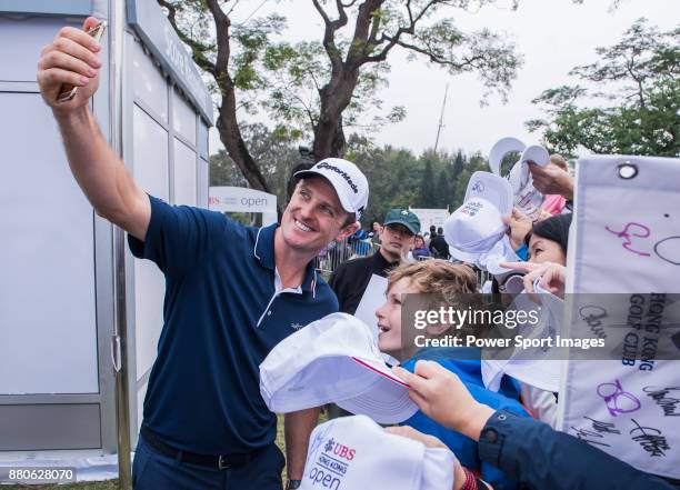 Justin Rose of England signs autograph for the fans during round three of the UBS Hong Kong Open at The Hong Kong Golf Club on November 25, 2017 in...