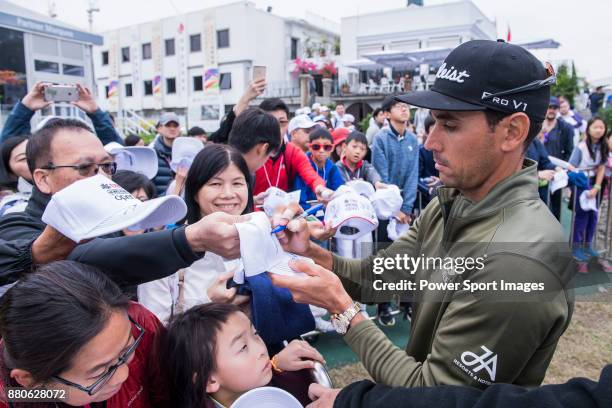 Rafa Cabrera Bello of Spain signs autograph for the golf fansduring round three of the UBS Hong Kong Open at The Hong Kong Golf Club on November 25,...