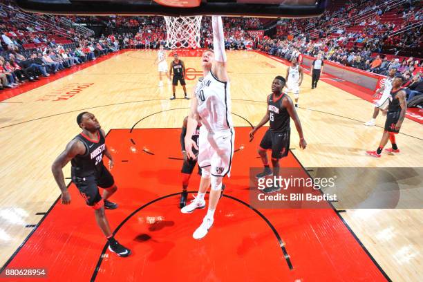 Timofey Mozgov of the Brooklyn Nets shoots the ball against the Houston Rockets on November 27, 2017 at the Toyota Center in Houston, Texas. NOTE TO...
