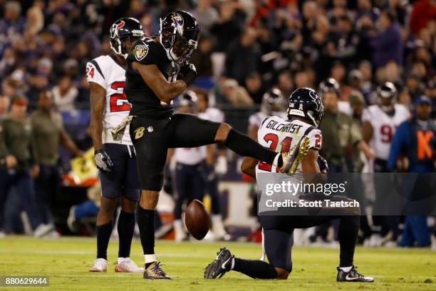 Wide Receiver Mike Wallace of the Baltimore Ravens celebrates after a catch in the second quarter against the Houston Texans at M&T Bank Stadium on...