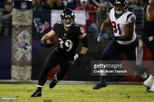 Running Back Danny Woodhead of the Baltimore Ravens carries the ball in the second quarter against the Houston Texans at M&T Bank Stadium on November...