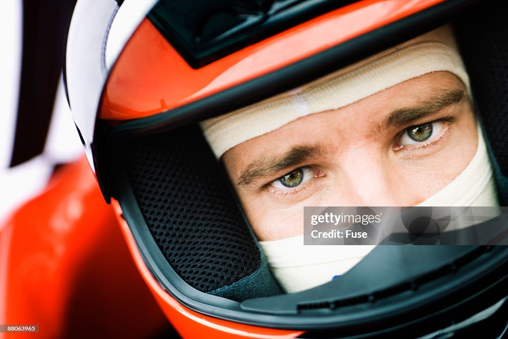 Racecar Driver Preparing for a Race