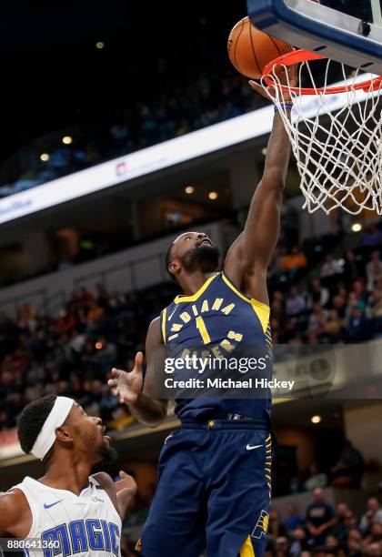 Lance Stephenson of the Indiana Pacers takes the ball to the hoop against Terrence Ross of the Orlando Magic at Bankers Life Fieldhouse on November...