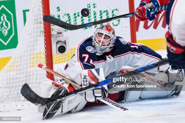 Columbus Blue Jackets goalie Sergei Bobrovsky watches the puck being deviated during the third period of the NHL game between the Columbus Blue...