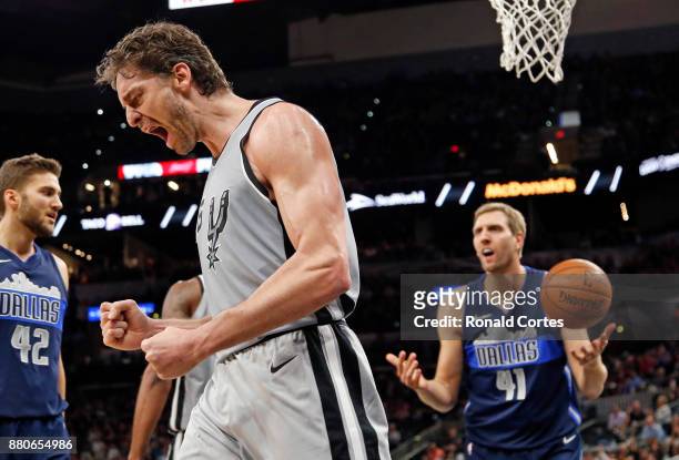 Pau Gasol of the San Antonio Spurs reacts after a basket and a foul by Dirk Nowitzki of the Dallas Mavericks at AT&T Center on November 27, 2017 in...