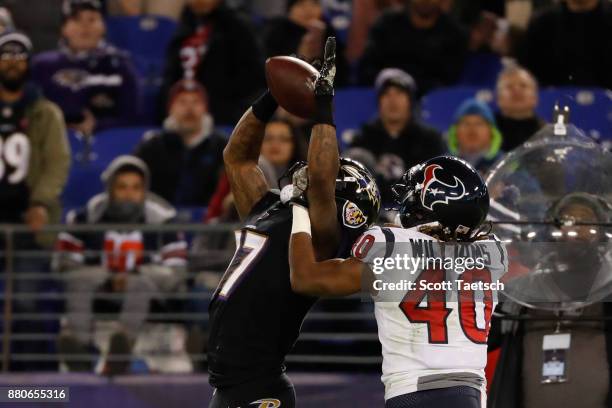 Cornerback Marcus Williams of the Houston Texans breaks up a pass to wide receiver Mike Wallace of the Baltimore Ravens in the third quarter at M&T...