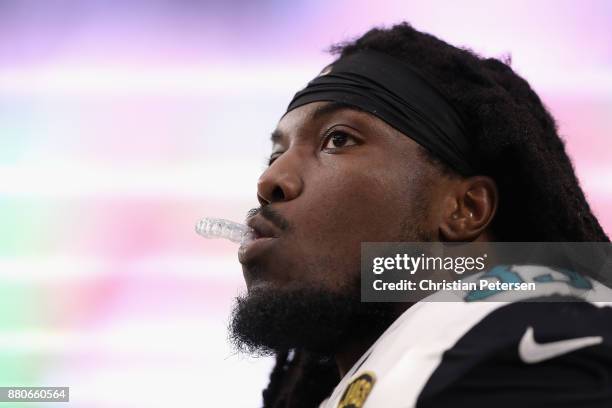 Running back Chris Ivory of the Jacksonville Jaguars watches from the sidelines during the first half of the NFL game against the Arizona Cardinals...