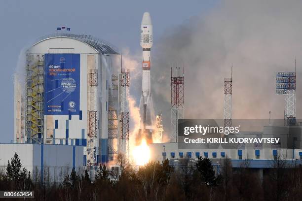 The Soyuz-2.1b rocket carrying Russia's Meteor-M 2-1 meteorological satellite lifts off from the launch pad at the Vostochny cosmodrome outside the...