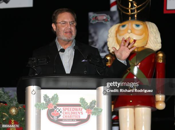 Texas motor Speedway President Eddie Gossage speaks at the Speedway Children's Charities-Texas Chapter Grant Ceremony and Tree Lighting at Texas...