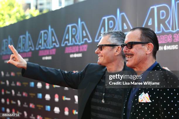 Jon Farriss and Kirk Pengilley of INXS arrive for the 31st Annual ARIA Awards 2017 at The Star on November 28, 2017 in Sydney, Australia.