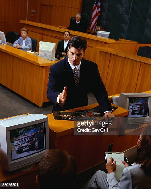 lawyer speaking to jury - cali morales stock pictures, royalty-free photos & images