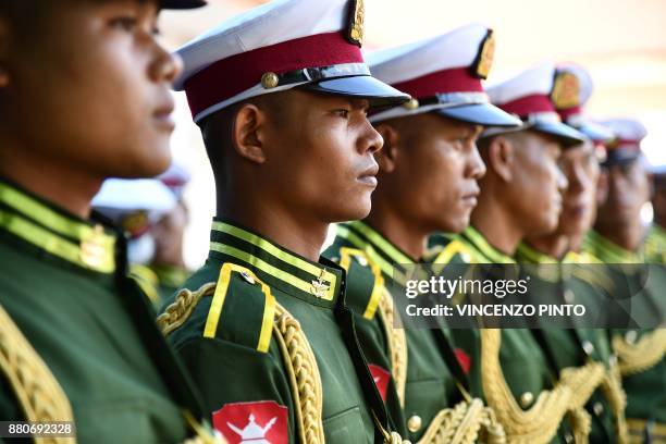 Members of the presidential guard prepare for the arrival of Pope Francis in Naypyidaw on November 28, 2017. - Pope Francis will hold talks with...