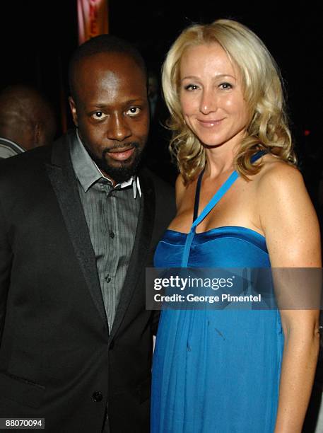 Musician Wyclef Jean and M.P. Belinda Stronach attend OneXOne at Maple Leaf Gardens on September 8, 2008 in Toronto, Canada.