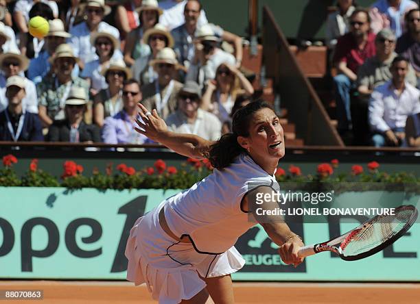 France's Virginie Razzano returns a ball to Italy's Tathiana Garbin during their French Open tennis third round match on May 30, 2009 at Roland...