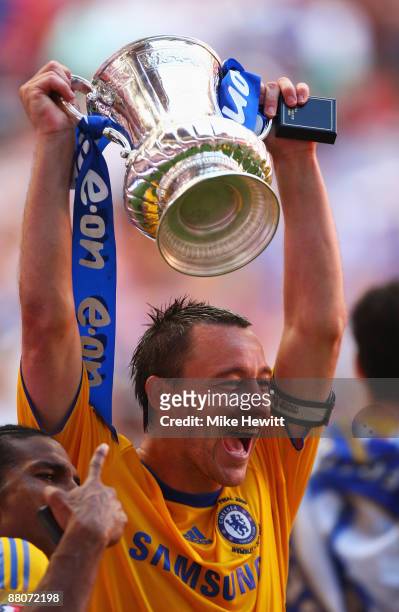 Captain John Terry of Chelsea celebrates with the trophy following victory during the FA Cup sponsored by E.ON Final match between Chelsea and...