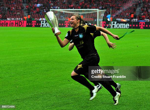 Alexandra Popp of Dusiburg celebrates with the winners trophy after the DFB Women's Cup Final between FCR Duisburg and Turbine Potsdam on May 30,...