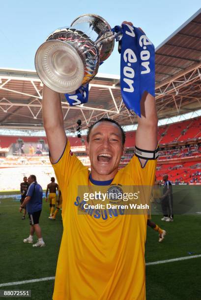 John Terry of Chelsea lifts the trophy after the FA Cup sponsored by E.ON Final match between Chelsea and Everton at Wembley Stadium on May 30, 2009...