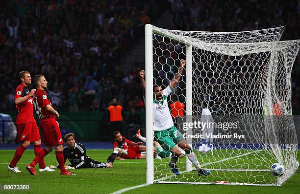 Hugo Almeida celebrates his team's first goal scored by his team mate Mesut Oezil of Bremen during the DFB Cup Final match between Bayer 04...