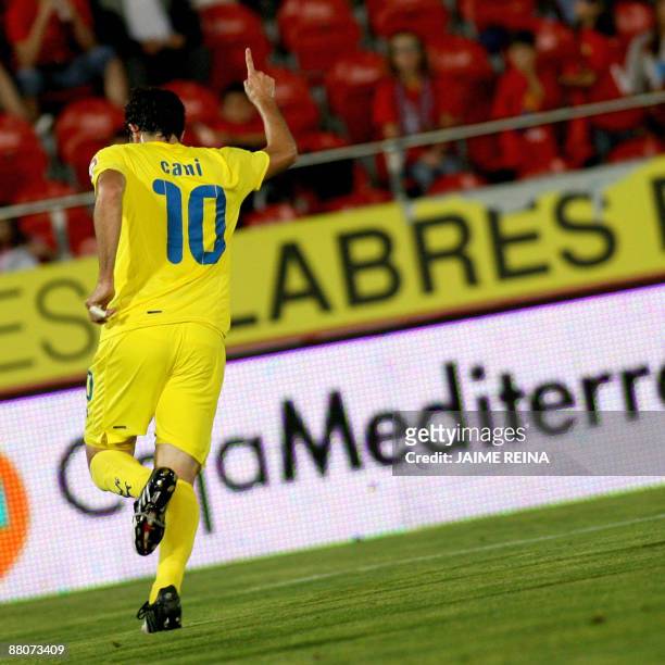 Villarreal's midfielder Cani celebrates after scoring against Mallorca's during the Spanish league football match at the Ono stadium in Palma de...