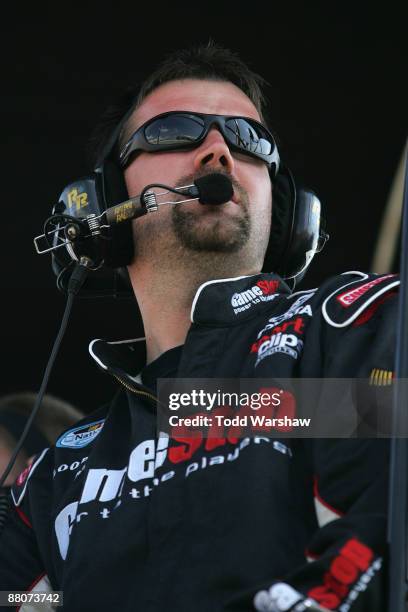 Dave Rogers, crew chief for the GameStop Toyota driven by Joey Logano, looks on during the NASCAR Nationwide Series Heluva Good! 200 at Dover...