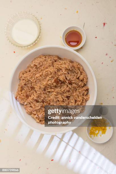 rice pudding in white bowl. - dried fruit peel stock pictures, royalty-free photos & images