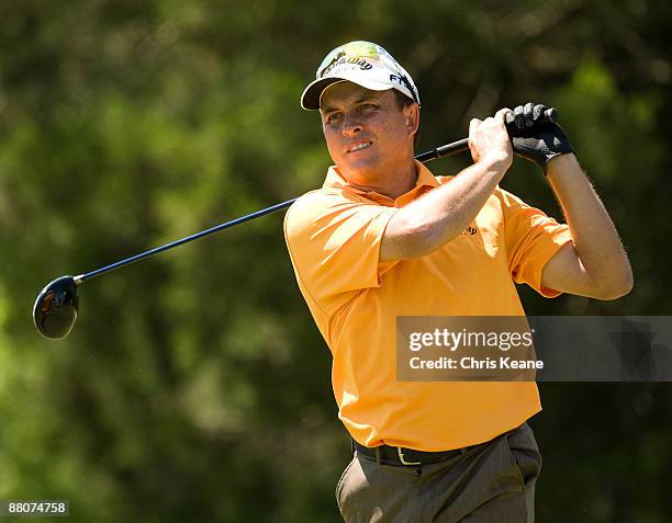 Scott Gardiner watches his tee shot on the eighth hole during the third round of the Rex Hospital Open Nationwide Tour golf tournament at the TPC...