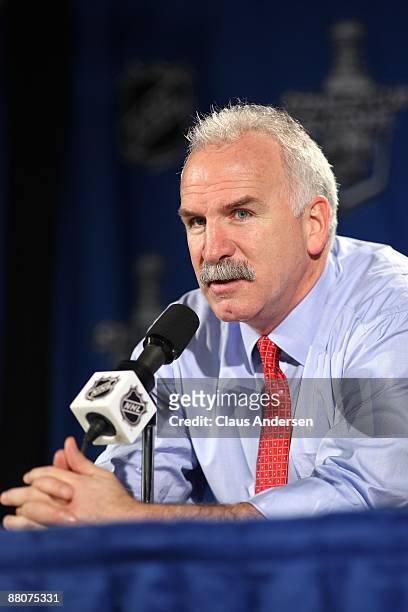 Head coach Joel Quenneville of the Chicago Blackhawks answers questions from the media the Detroit Red Wings during Game Five of the Western...