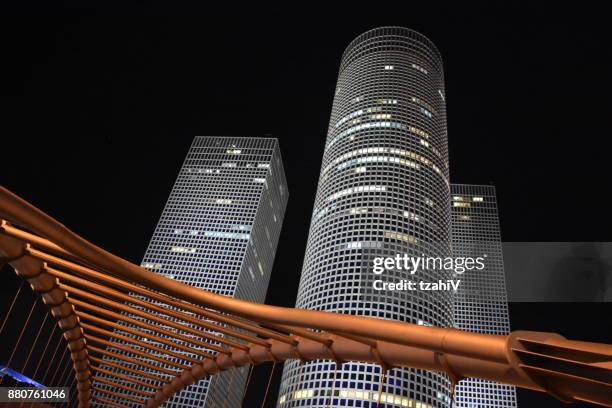 azrieli tower at night - tel aviv jaffa stock pictures, royalty-free photos & images