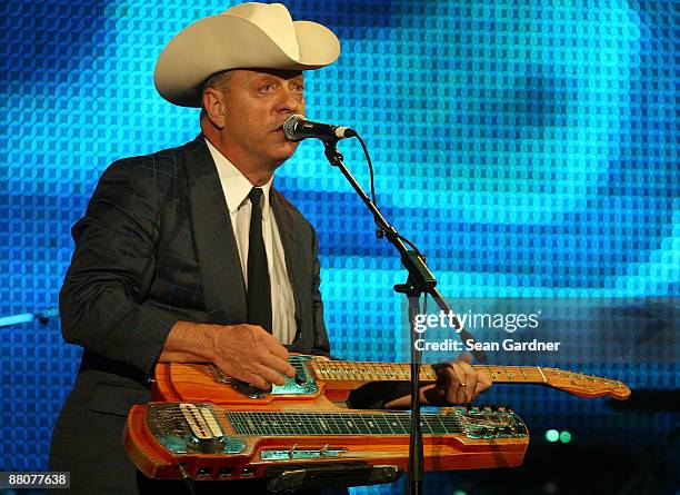 Junior Brown preforms during the Domino Effect Benefit Concert at the New Orleans Arena on May 30, 2009 in New Orleans, Louisiana.