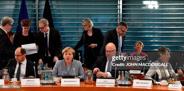 German Agriculture Minister Christian Schmidt, German Chancellor Angela Merkel, German Chief of Staff and interim Finance Minister Peter Altmaier,...