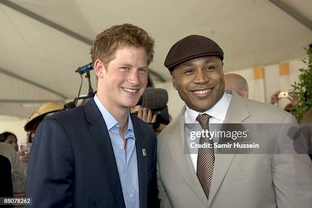 Prince Harry and LL Cool J attend the 2009 Veuve Clicquot Manhattan Polo Classic on Governor's Island on May 30, 2009 in New York City.