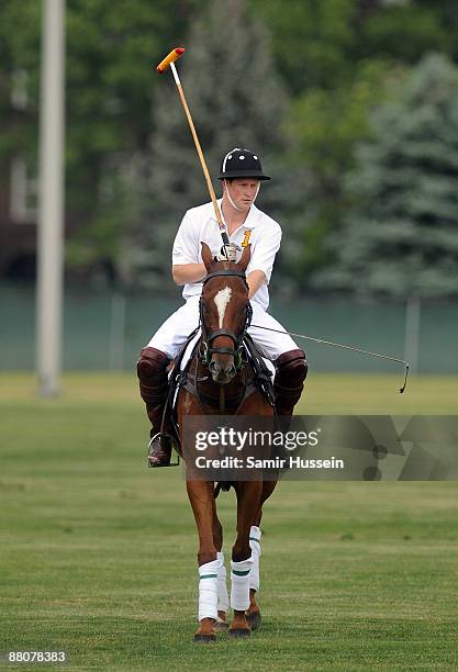 Prince Harry competes during the 2009 Veuve Clicquot Manhattan Polo Classic on Governor's Island on May 30, 2009 in New York City.