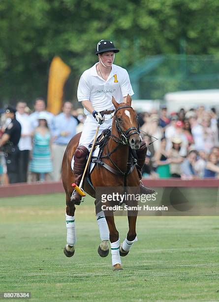 Prince Harry competes during the 2009 Veuve Clicquot Manhattan Polo Classic on Governor's Island on May 30, 2009 in New York City.