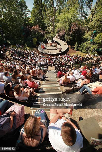 Matinee audience watch a production of Much Ado About Nothing at The Open Air Theatre on May 30, 2009 in Regents Park, London. Warm temperatures...