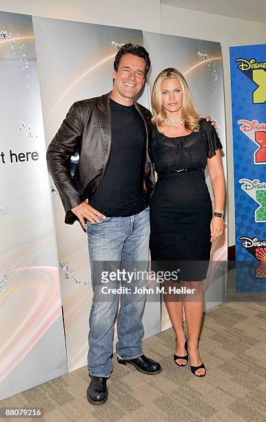 Actors David James Elliott and Natasha Henstridge from the television show "Impact" attend the 2009 Disney and ABC TV Summer Press Junket at the Walt...
