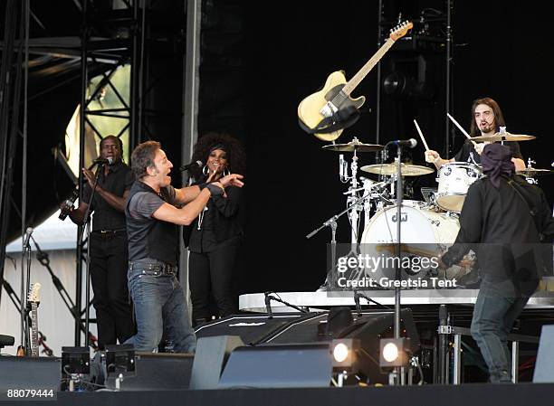 Bruce Springsteen throws away his guitar while performing live with the E Street Band on day one of the 40th Pinkpop Festival at Megaland on May 30,...