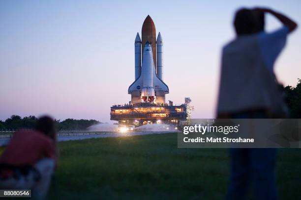 Space Shuttle Endeavour rolls atop the crawler transporter from launch pad 39-b to launch pad 39-a at Kennedy Space Center on May 31, 2009 in Cape...