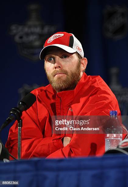 Dan Cleary of the Detroit Red Wings answers questions from the media at a press conference after their 2-1 overtime win against the Chicago...