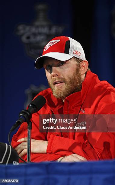 Dan Cleary of the Detroit Red Wings answers questions from the media at a press conference after their 2-1 overtime win against the Chicago...