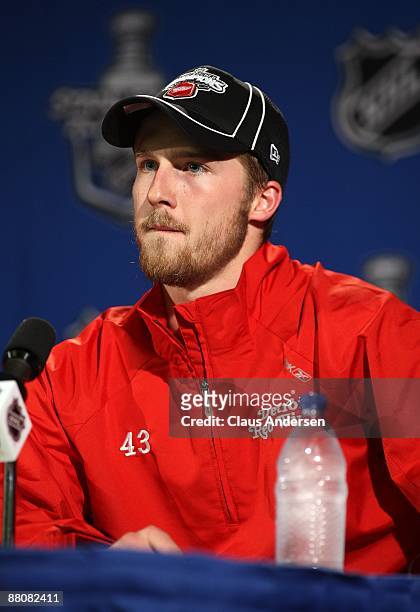 Darren Helm of the Detroit Red Wings listens questions from the media at a press conference after their 2-1 overtime win against the Chicago...