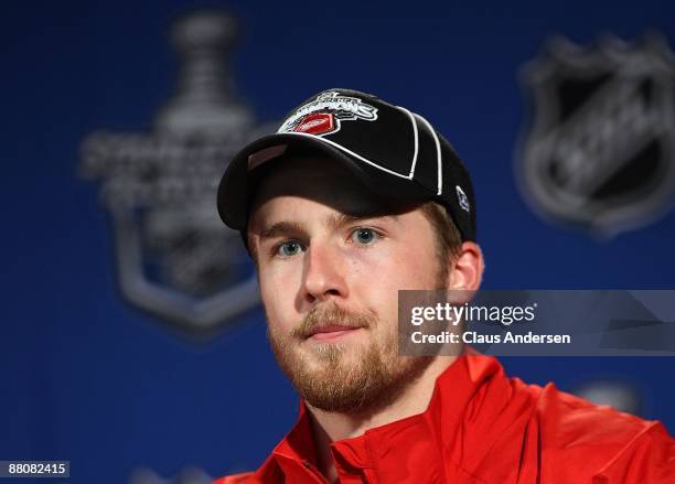 Darren Helm of the Detroit Red Wings listens questions from the media at a press conference after their 2-1 overtime win against the Chicago...